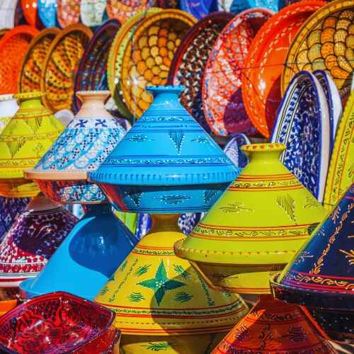 Morocco vibrant travel guide – colorful traditional Moroccan tagine pots.
